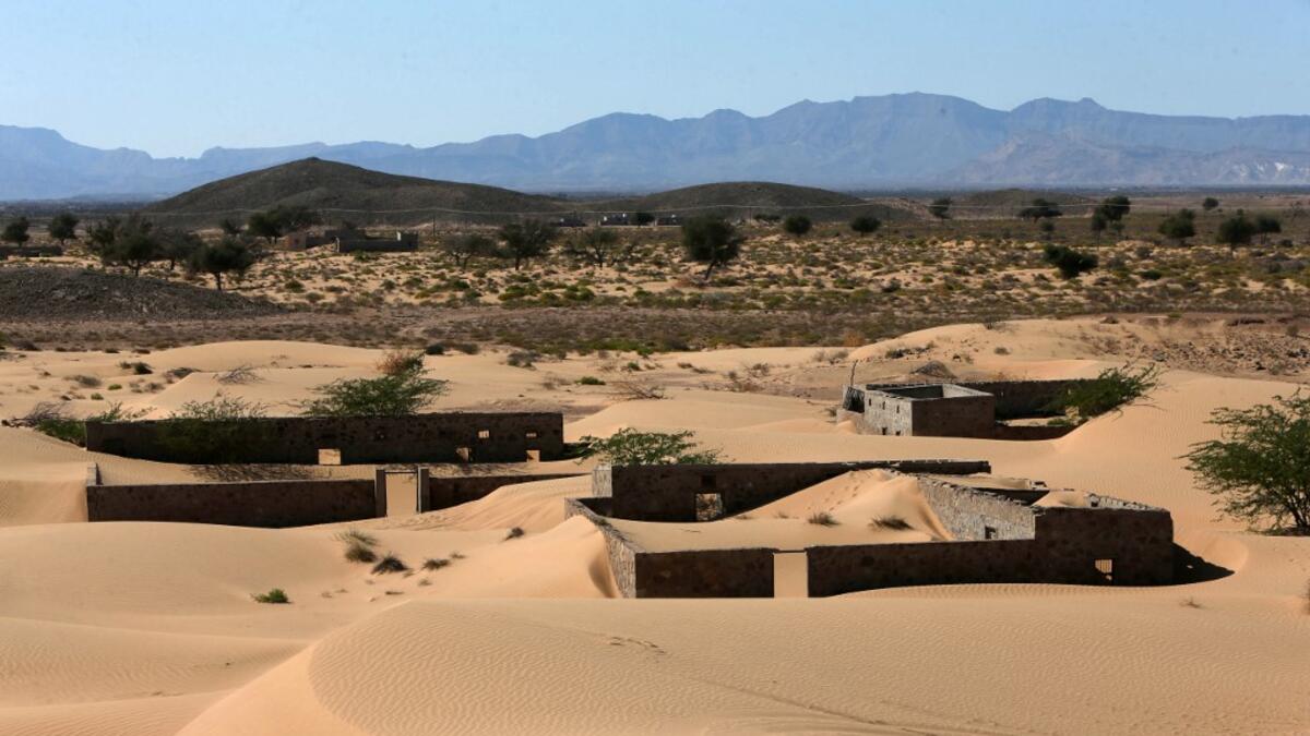 The advance of the desert is not specific to the sultanate of Oman, and experts say climate change is one of the factors propelling the phenomenon in different parts of the world.  MOHAMMED MAHJOUB / AFP