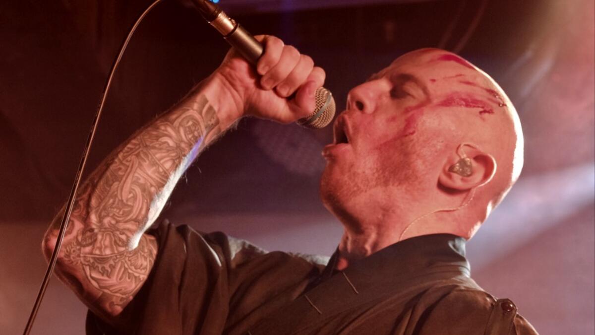 This picture taken on December 3, 2020 shows Joe Henley, a leading vocalist of Taiwanese death metal band 'Dharma' singing during a rehearsal in Taipei. Sam Yeh / AFP