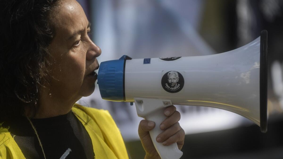 A Mexican activist takes part in a protest in front of the British embassy to demand the freedom of Wikileaks founder Julian Assange, in Mexico City, on January 4, 2021. After British justice denied the US extradition request, Mexican president Andres Manuel Lopez Obrador offered political asylum to Assange. Pedro PARDO / AFP