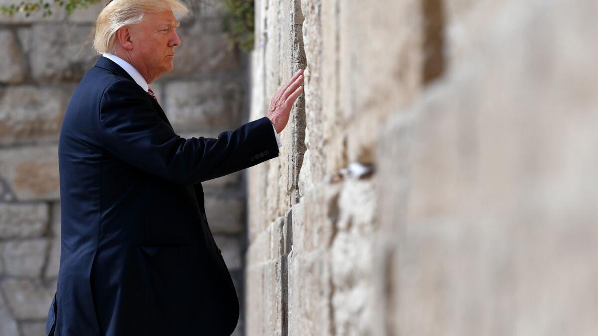 AFP presents a retrospective photo package of 60 pictures marking the 4-year presidency of President Trump. US President Donald Trump visits the Western Wall, the holiest site where Jews can pray, in Jerusalem’s Old City on May 22, 2017.  MANDEL NGAN / AFP