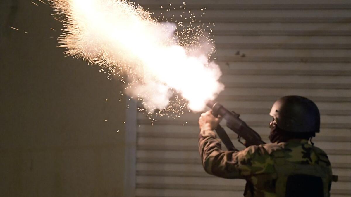 The social unrest comes at a time of economic crisis, worsened by the pandemic, that has sparked rapid inflation and high youth unemployment and led many people to leave Tunisia. FETHI BELAID / AFP