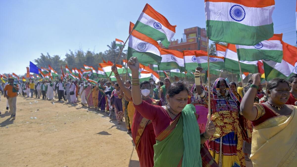 Activists and farmers take part in a protest as they continue to demonstrate against the central government's recent agricultural reforms, in Bangalore on January 26, 2021. Manjunath Kiran / AFP
