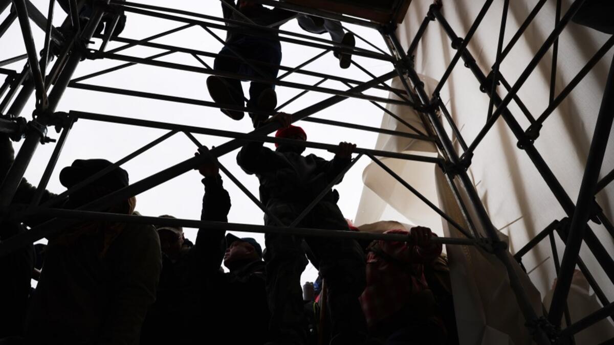 Trump supporters had gathered in the nation's capital to protest the ratification of President-elect Joe Biden's Electoral College victory over President Trump in the 2020 election. Spencer Platt/Getty Images/AFP