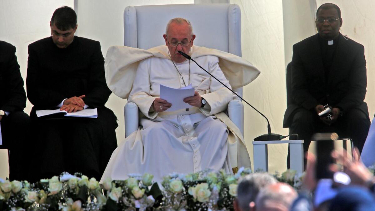 Pope Francis speaks during an interfaith service with many of Iraq's religious minorities