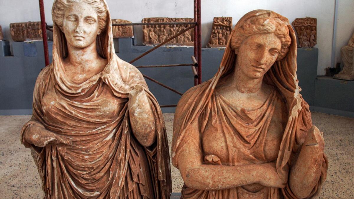 a view two female Roman sculptures on display at the Cyrene Museum which houses Greco-Roman artefacts, in the eastern Libyan town of Shahat