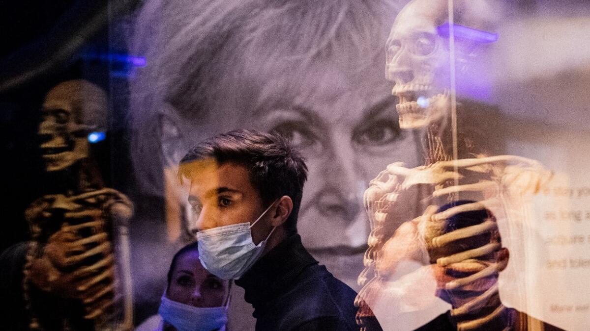 People visit the "Body Worlds", the anatomical art exhibition of plastinated human bodies