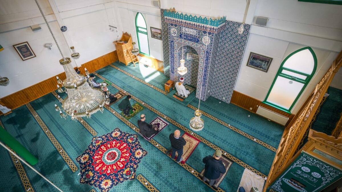 Muslims pray in the Turkish Mevlana Mosque in Hilversum