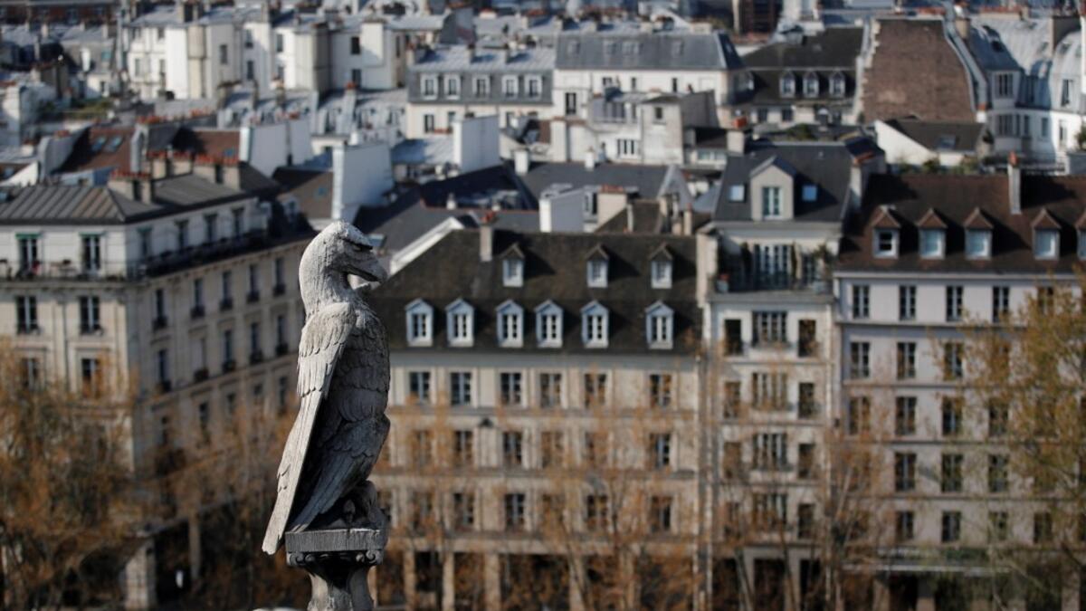 A bird statue is seen at the Notre-Dame de Paris Cathedral