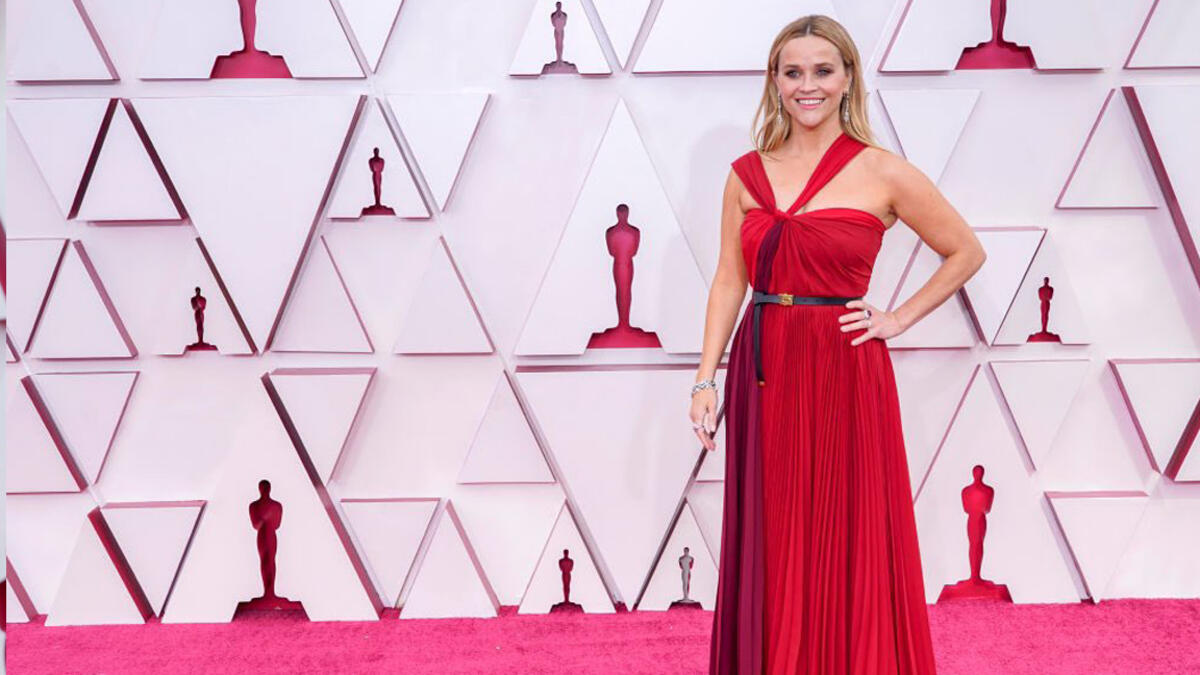 Reese Witherspoon championed a Red Halter-Neck Gown