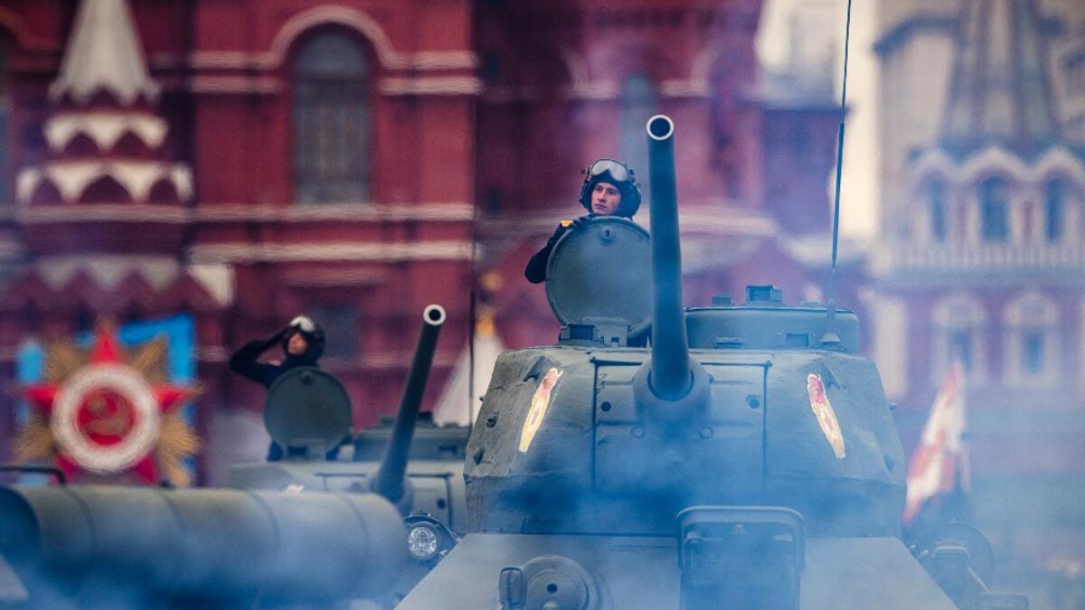 Historical T-34 tanks move through Red Square during the Victory Day military parade in Moscow