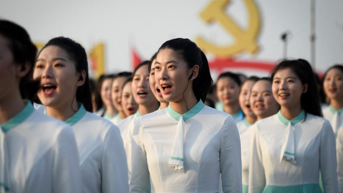 Members of Chorus sing during a rehearsal before the celebrations marking the 100th anniversary of the founding of the Communist Party of China in Beijing