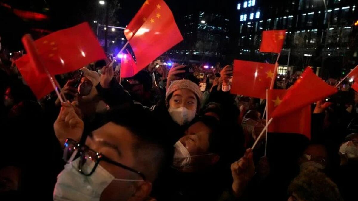 العد التنازلي للاحتفال بالسنة الجديدة في حديقة شوجانغ في بكين، الأحد 1 يناير 2023 (ا ف ب)