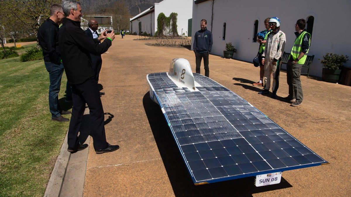 The Innoptus car, which featured a flat surface adorned with photovoltaic panels and a sleek white exterior, impressed judges with its efficiency and speed.