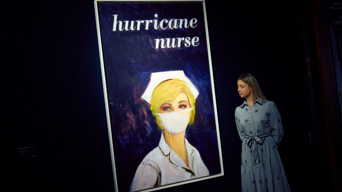 A gallery assistant poses with Hurricane Nurse by Richard Prince during a photocall for the 20/21 Century London Evening Sale , The artwork is estimated to go under the hammer for 3,500,000 5,500,000 GBP (4,158,000 - 6,535,000 EUR / 4,590,000 - 7,213,000 USD (.photo by afp)
