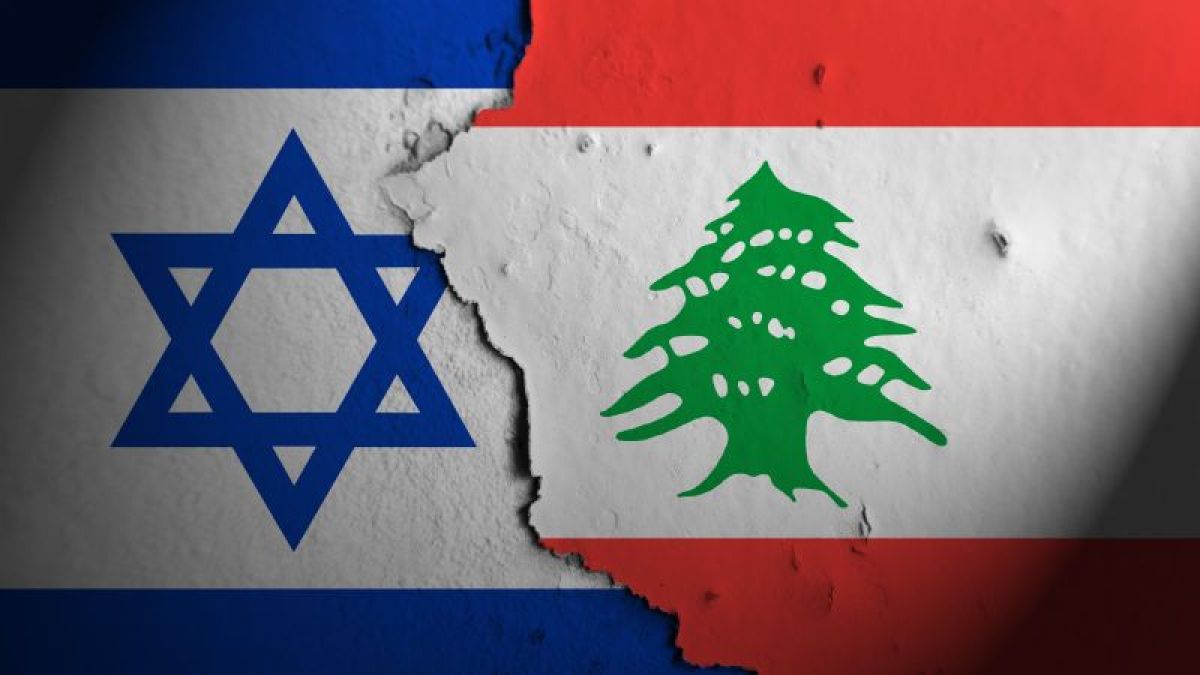 علمَا إسرائيل ولبنان يفصل بينهما صدع يرمز إلى التوتر بين البلدين.