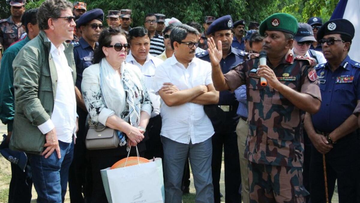 Bangladesh Border Guard 34 Battalion Commander Lt Col Manjurul Hasan (R) speaks during the high-level 15-member delegation of the UN Security Council visit to Tombru in the Bangladeshi district of Bandarban on April 29, 2018. AFP