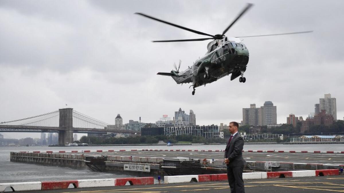 Marine One, carrying US President Donald Trump, lands in lower Manhattan in New York on September 23, 2018. Trump is in New York for the UN General Assembly. 
MANDEL NGAN / AFP