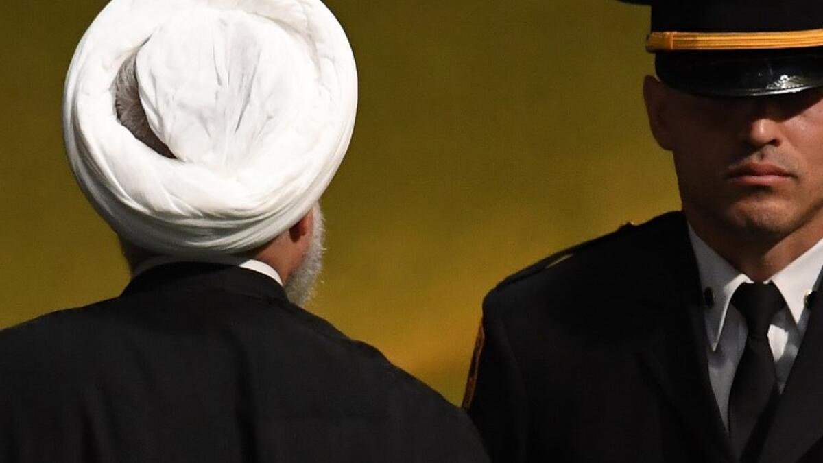 Iranian President Hassan Rouhani departs after addressing the General Debate of the 73rd session of the General Assembly at the United Nations in New York September 25, 2018. 
TIMOTHY A. CLARY / AFP