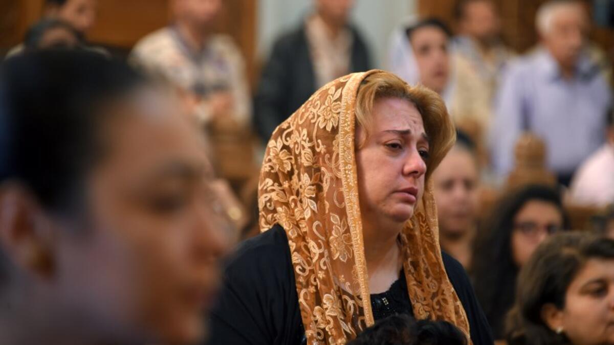 A Coptic Christian woman mourns victims killed in an attack a day earlier, during an early morning ceremony at the Prince Tadros church in Egypt's southern Minya province, on November 3, 2018. 
MOHAMED EL-SHAHED / AFP