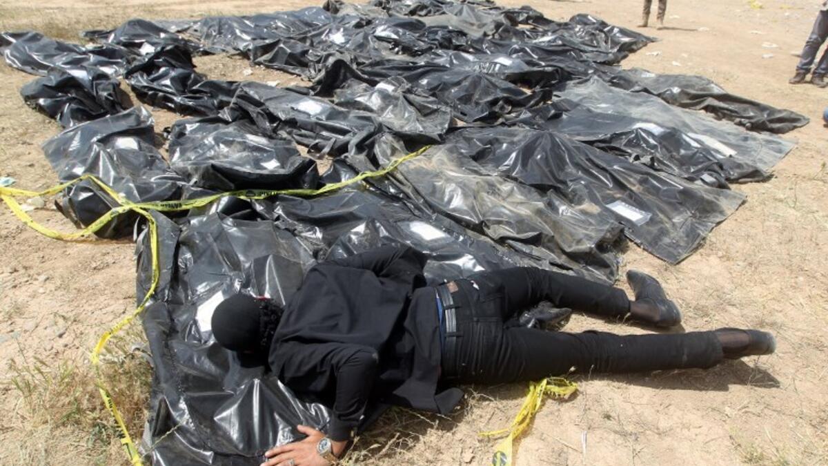 The Islamic State group left behind more than 200 mass graves in Iraq containing up to 12,000 victims that could hold vital evidence of war crimes, the UN said November 6, 2018. (AHMAD AL-RUBAYE / AFP)