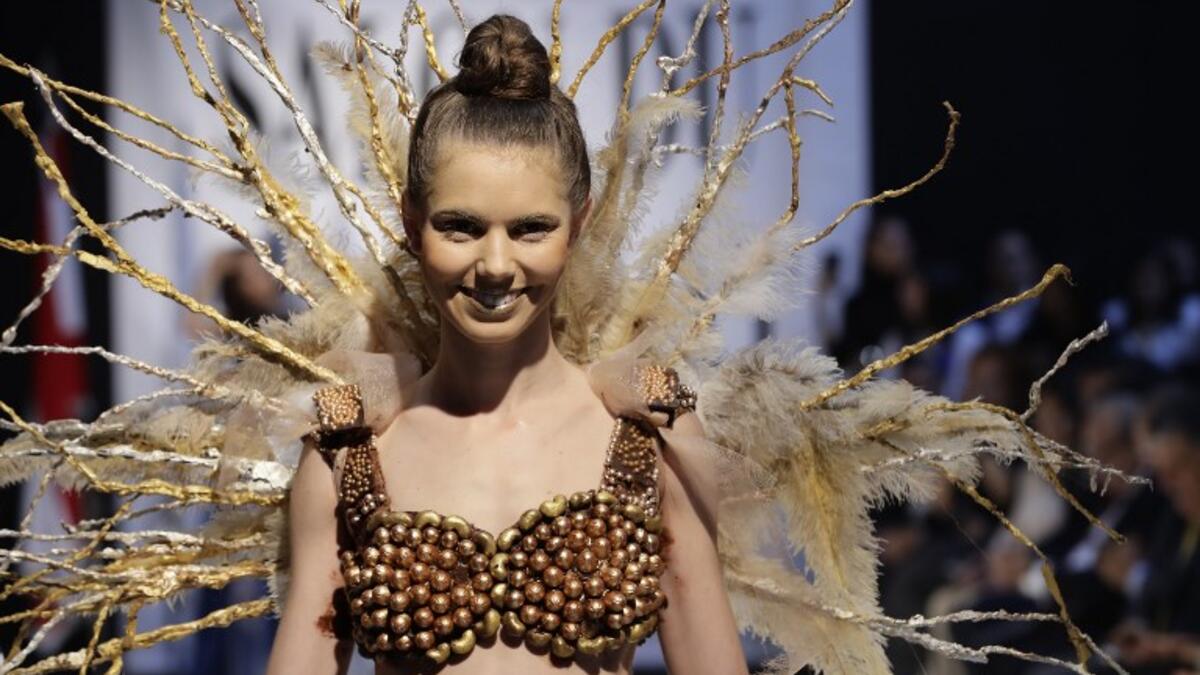 A model displays a chocolate dress at the 2018 chocolate fair fashion show in Beirut on November 8, 2018. 
JOSEPH EID / AFP