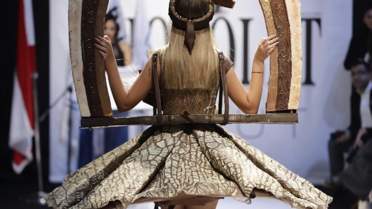 A model displays a chocolate dress at the 2018 chocolate fair fashion show in Beirut on November 8, 2018. 
JOSEPH EID / AFP