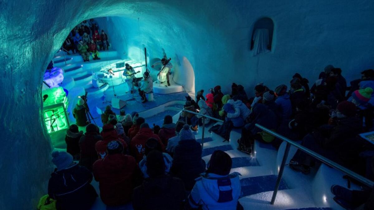 Today, the US-born artist is in charge of an ice orchestra playing a series of concerts at sub-zero temperatures in a vast, custom-built igloo high in the Italian Alps. 
Marco BERTORELLO / AFP