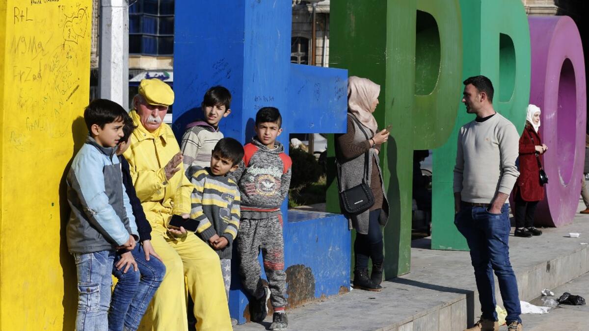 Dressed in yellow from head-to-toe, Abu Zakkour is hailed as part of the "heritage" of the northern Syrian city of Aleppo, along with its medieval citadel and its ancient covered markets. 
For nearly 36 years, the 70-year-old has strictly abided by a full monochrome look, sporting only yellow apparel and accessories. 

LOUAI BESHARA / AFP