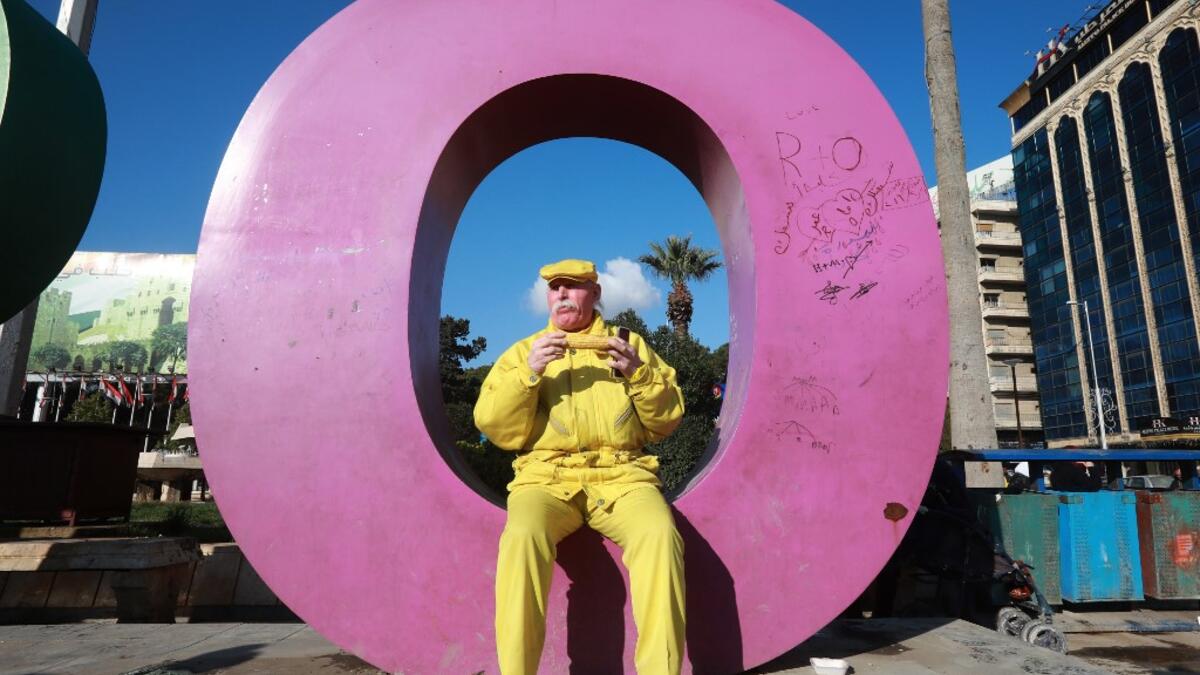 For nearly 36 years, the 70-year-old has strictly abided by a full monochrome look, sporting only yellow apparel and accessories. 

LOUAI BESHARA / AFP