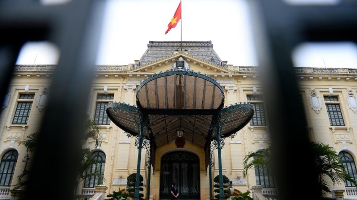 Workers perform repair works at the government guest house in preparation for the upcoming second summit between US President Donald Trump and North Korean leader Kim Jong Un in Hanoi on February 19, 2018. 
Nhac NGUYEN / AFP