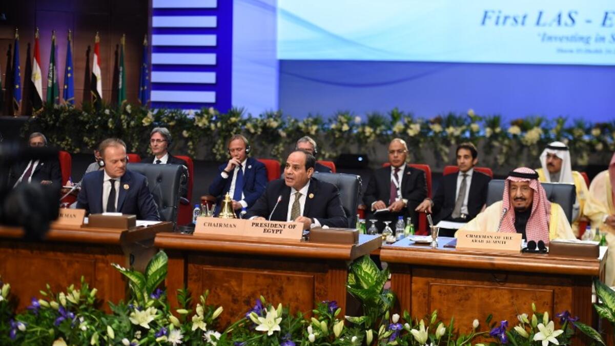President of the European Council Donald Tusk (L) along with King Salman of Saudi Arabia (R) listen to Egyptian President Abdel Fattah al-Sisi (C) as he speaks during the opening of the first joint European Union and Arab League summit in the Egyptian Red Sea resort of Sharm el-Sheikh, on February 24, 2019. 
MOHAMED EL-SHAHED / AFP