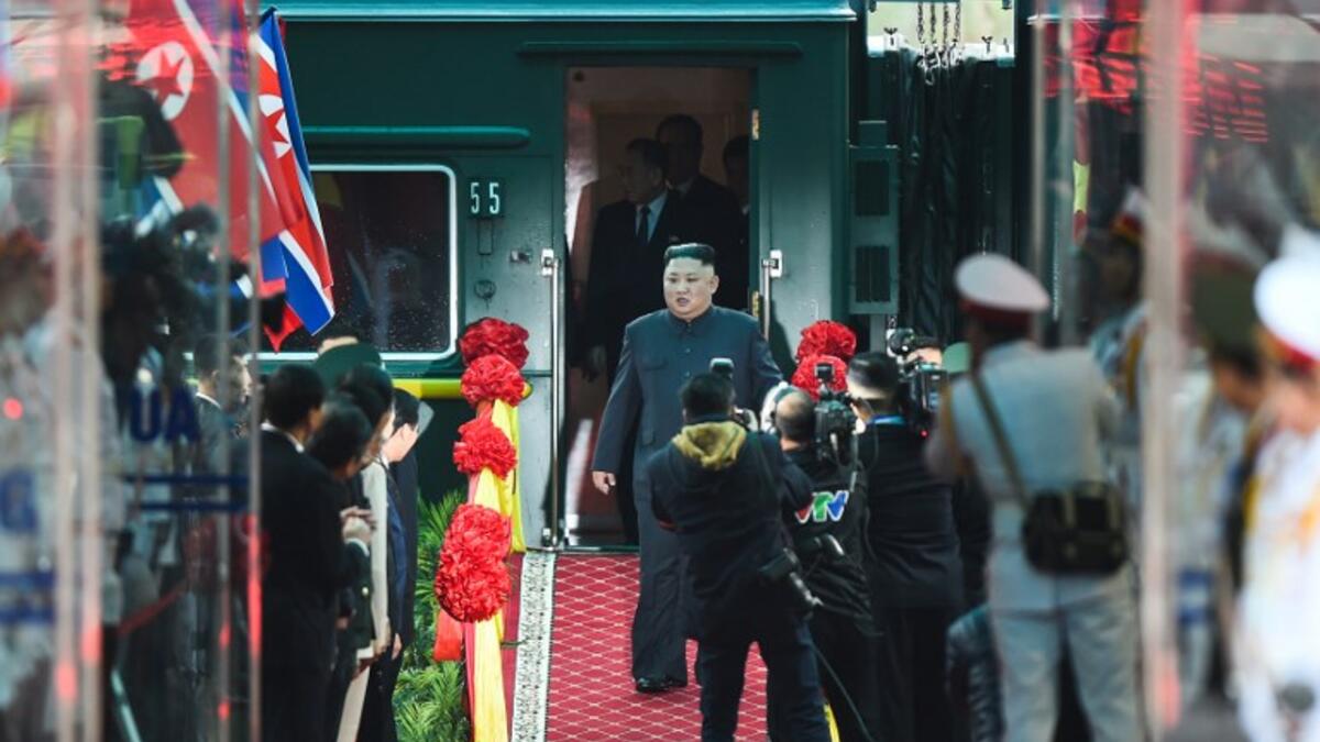 North Korea's leader Kim Jong Un (C) arrives at the Dong Dang railway station in Dong Dang, Lang Son province, on February 26, 2019, to attend the second US-North Korea summit. 
Nhac NGUYEN / AFP
