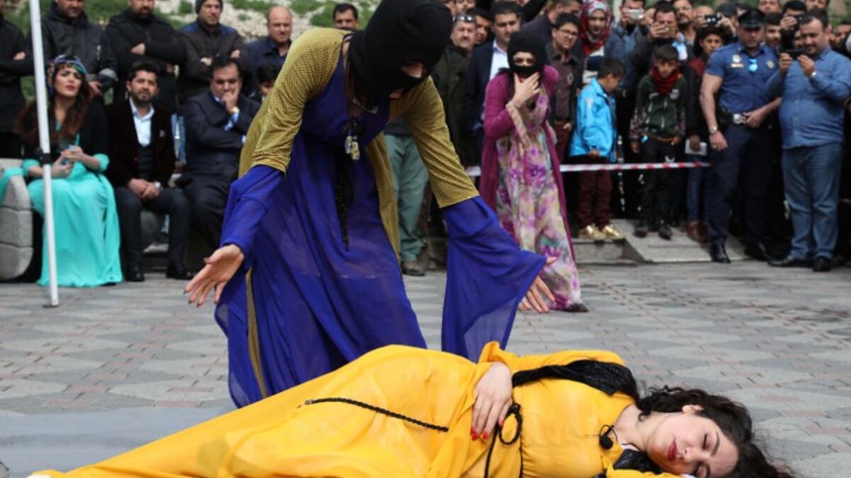 Iraqi Kurdish actresses perform in an open-air play in Arbil, the capital of the northern Iraqi Kurdish autonomous region
SAFIN HAMED / AFP