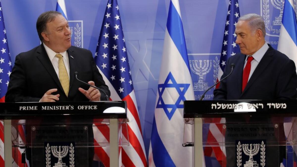 US Secretary of State Mike Pompeo (L) and Israeli Prime Minister Benjamin Netanyahu deliver a joint statement during their meeting in Jerusalem on March 20, 2019. Pompeo and Netanyahu vowed today to counter Iranian "aggression" as the two met in Jerusalem just weeks ahead of Israel's elections.

JIM YOUNG / POOL / AFP