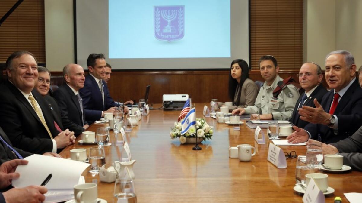 US Secretary of State Mike Pompeo (L) and Israeli Prime Minister Benjamin Netanyahu (R) attend a meeting in Jerusalem on March 20, 2019. Pompeo and Netanyahu vowed today to counter Iranian "aggression" as the two met in Jerusalem just weeks ahead of Israel's elections.
JIM YOUNG / POOL / AFP