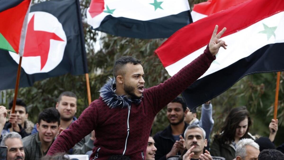 US President Donald Trump broke with decades of US policy, signing a proclamation recognising Israeli sovereignty over the strategic territory it seized from Syria in the Six-Day War of 1967 and later annexed in a move never recognised by the international community. 
Louai Beshara / AFP