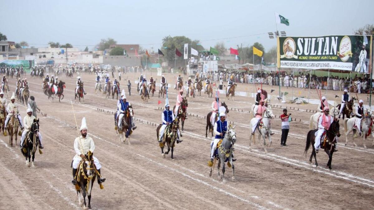 Traditional drumbeats and melodious shahnai are drowned out by thundering hoofs in the small Pakistani city of Tulamba, as riders pound down a dusty track seeking world record glory in the ancient sport of tent-pegging.

SS MIRZA / AFP