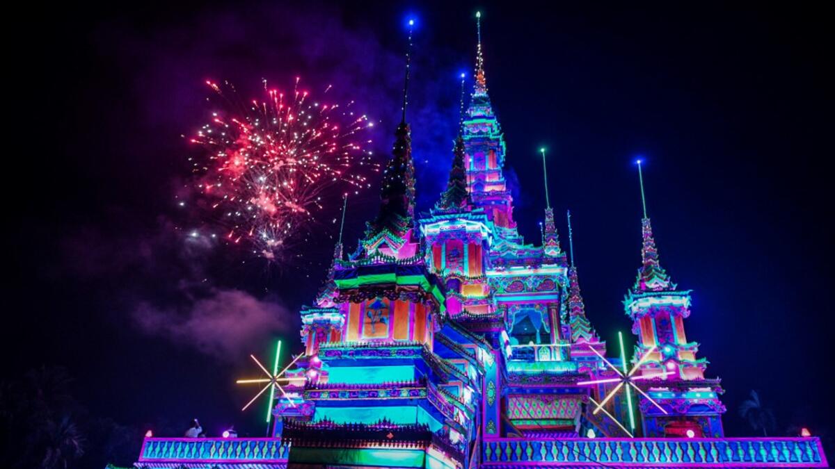 Fireworks explode over a makeshift palace during abbot Kay Lar Tha's funeral in Mudon, Mon State. 
Ye Aung THU / AFP