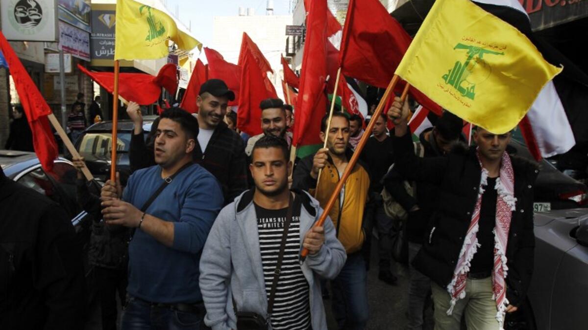 Supporters of the Popular Front for the Liberation of Palestine (PFLP) take part in a demonstration in Bethlehem in the Israeli occupied West Bank, as protests continue in the region amid anger over the U.S. president's recognition of Jerusalem as Israel's capital. 
Musa AL SHAER / AFP