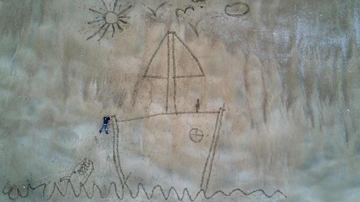 تمة مكافأة الصور التي حملت طابعًا إبداعيًا ومنها صورة بعنوان "Ugo sur la plage"  "أوغو على الشاطئ" التقطت بواسطة رغا