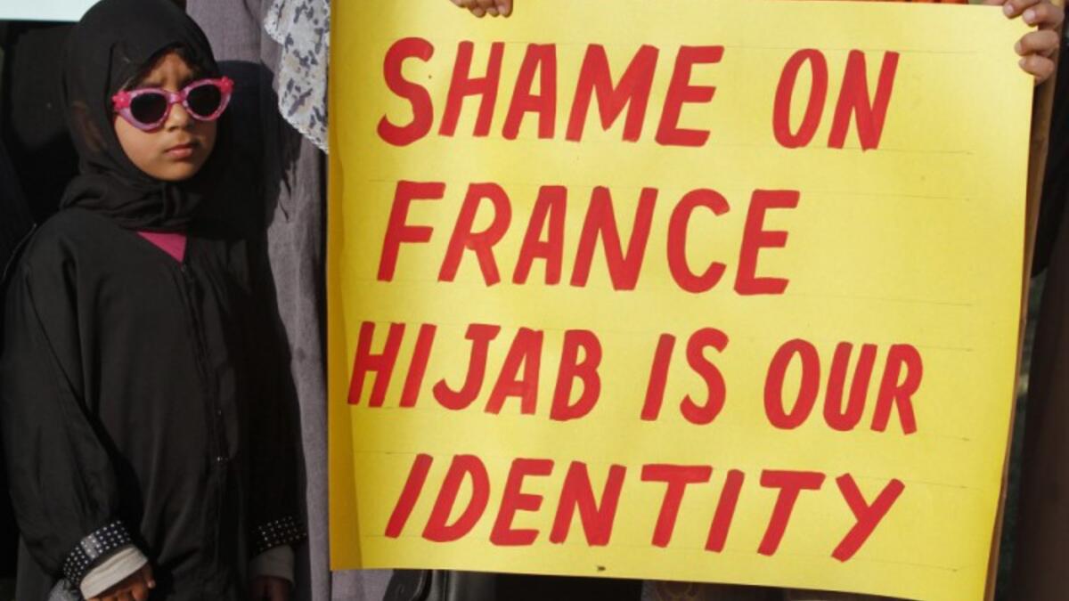 Shame-on-france-hijab-is-our-identity-french-authorities-ban-women-sign-protest-www.barenakedislam.com-2015
