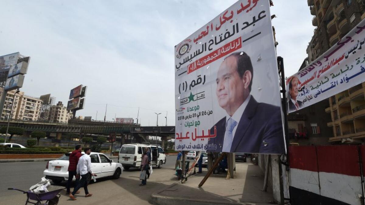 Sisi election banners looking forward to three-day poll between 26-28 March, 2018 (AFP/File Photo).