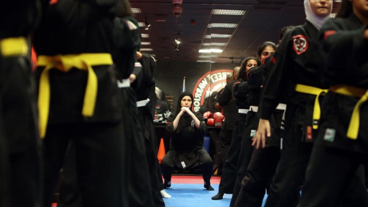Kuwaiti women practise hybrid martial art Kajukenbo in a club in Kuwait City.
Yasser Al-Zayyat / AFP