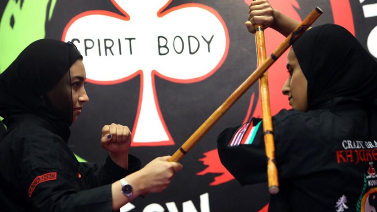 Kuwaiti women practise hybrid martial art Kajukenbo in a club in Kuwait City.
Yasser Al-Zayyat / AFP