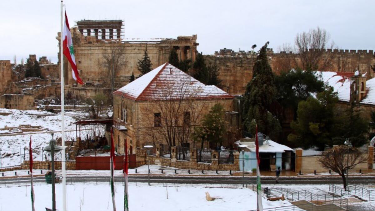 Partial view of the snow-clad Roman ruins in the city of Baalbeck in Lebanon's Bekaa valley. 
STRINGER / AFP