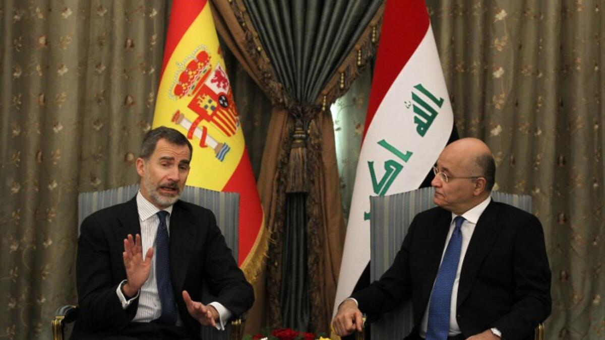 Iraqi President Barham Saleh (R) receives the King of Spain Felipe VI in the capital Baghdad on January 30, 2019. King Felipe visited special forces helping Iraq fight terrorists, during the first trip by a Spanish monarch to the war-ravaged country in four decades, a diplomat said.
AHMAD AL-RUBAYE / AFP