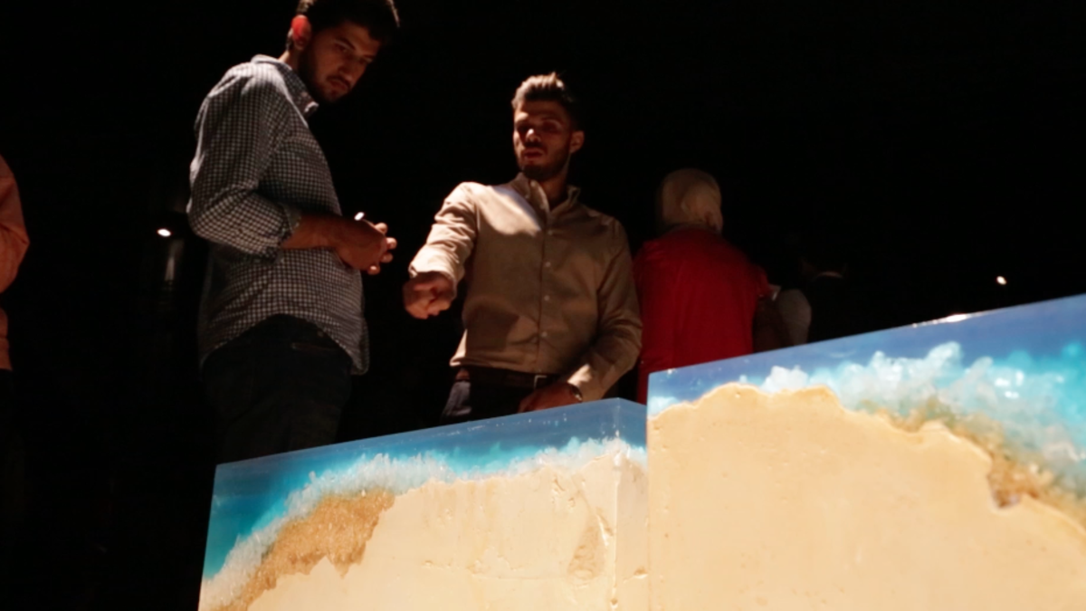 Architect and designer Tarek Hreish discusses his project which utilizes raw materials for craftsmanship, blending traditional and modern elements. (Al Bawaba/Salim Essaid)