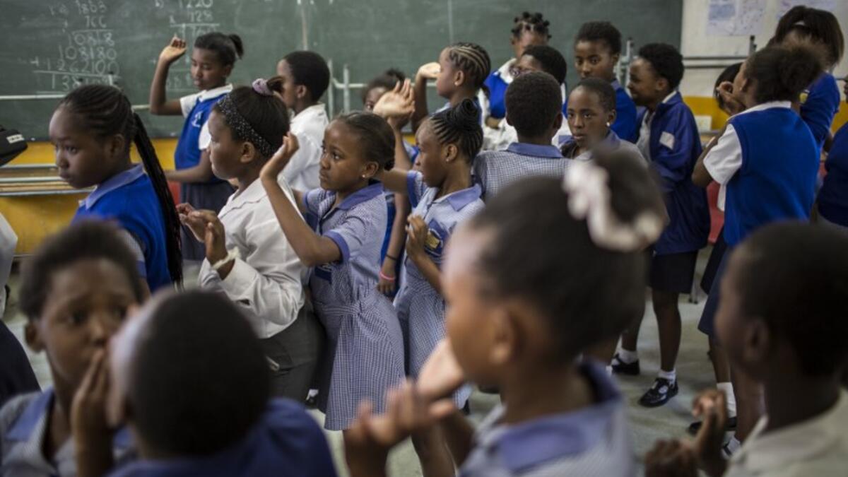 Girls line up to practice self defence methods during a session with NGO Action Breaks Silence (ABS) called "Empowerment through self-defence for women and girls". (GULSHAN KHAN / AFP)