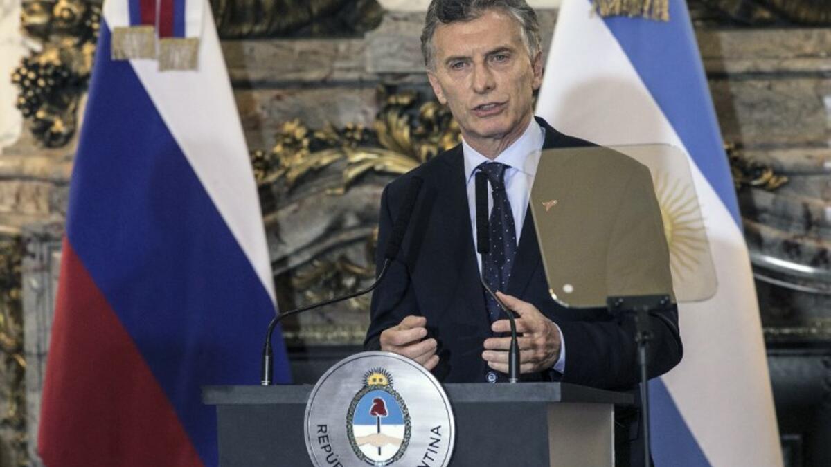 Argentina's President Mauricio Macri delivers a joint press conference with Russia's President Vladimir Putin (out of frame) at the Casa Rosada presidential house in Buenos Aires, in the sidelines of the G20 Leaders' Summit on December 01, 2018. 
RAGGIO ALBERTO / AFP