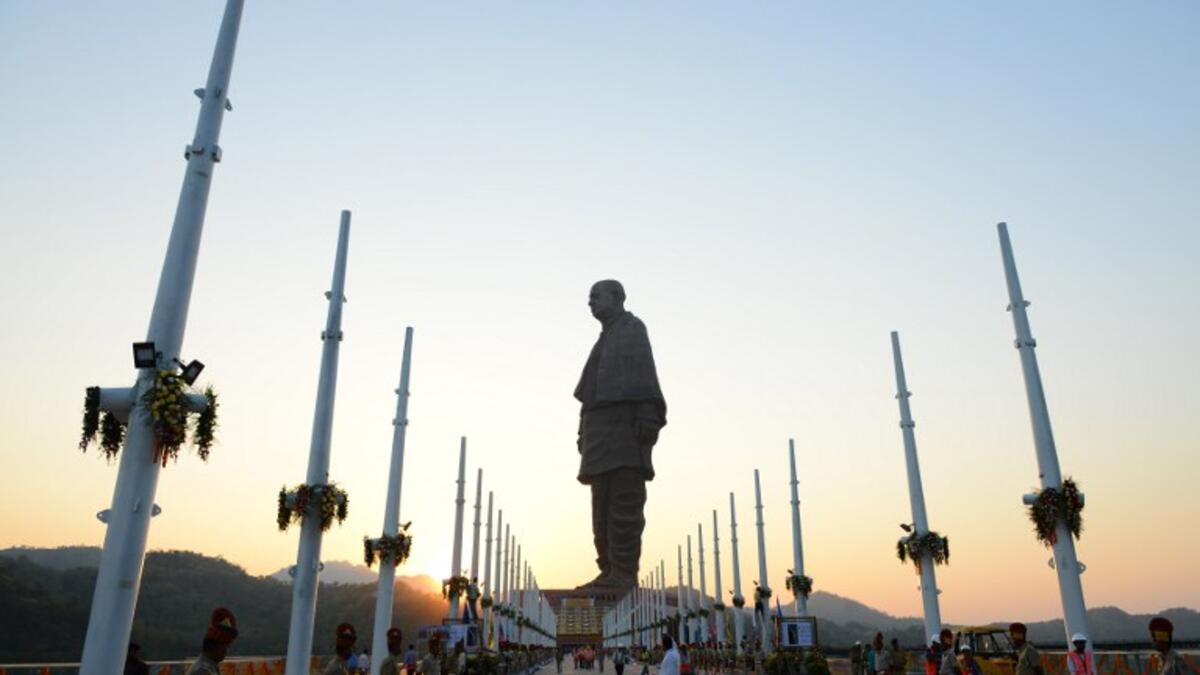 Indian policemen stand guard near the "Statue Of Unity". (SAM PANTHAKY / AFP)